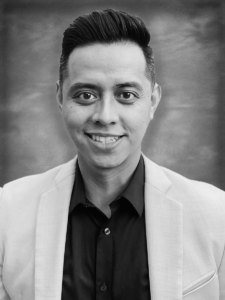 Black and white portrait of Cris Cortez